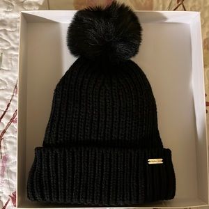 Black beanie and matching scarf.